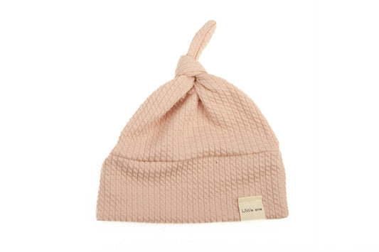 Rosa Zopfmustermütze